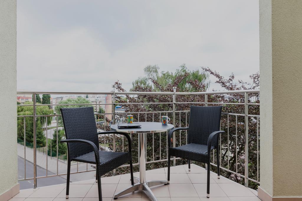 Riverside Apartment With Balcony By Noclegi Renters Свиноуйсьце Экстерьер фото