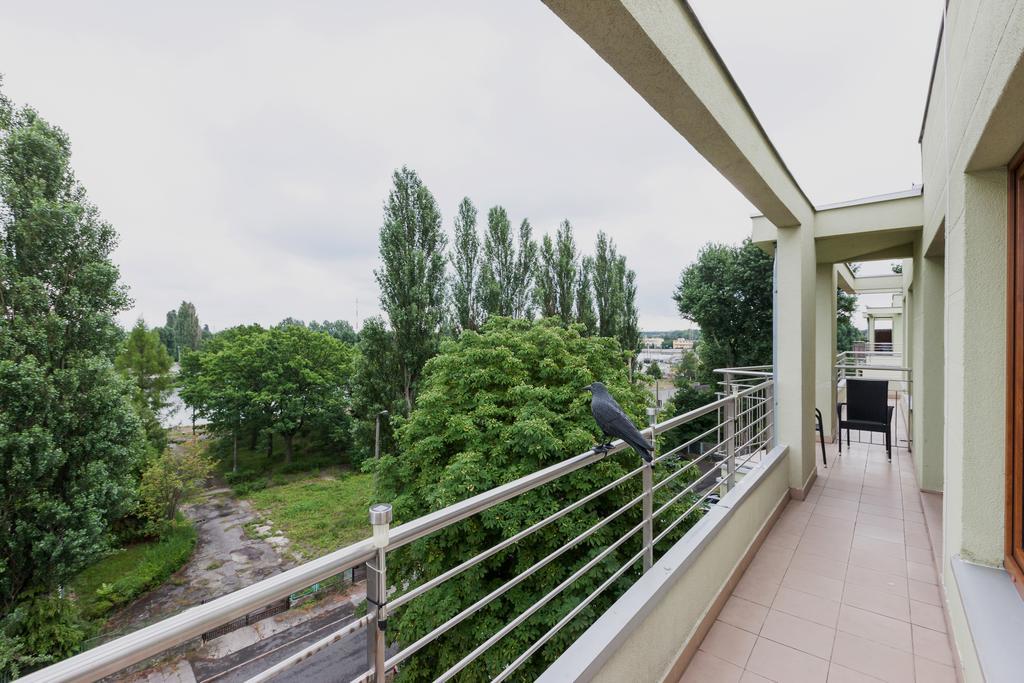 Riverside Apartment With Balcony By Noclegi Renters Свиноуйсьце Экстерьер фото